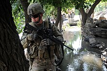 Sgt. Timothy Stewart, with Alpha Company, 1st Battalion, 143rd Infantry Regiment provides security along the Whatapur Canal in Kunar Province, Afghanistan, July 10, 2012 120710-F-NG741-146 (7630457836).jpg