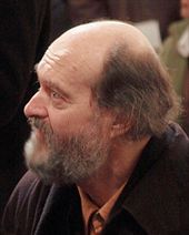 Arvo Pärt bearded balding man facing left