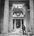 Graffiti left by Russian soldiers covers the pillars inside the ruins of the German Reichstag building, 3 July 1945