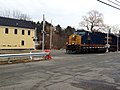 GEVO leads a Pan Am Railways mixed freight train in Andover, Massachusetts