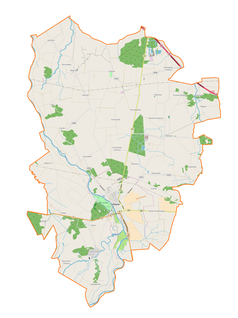 Mapa konturowa gminy Uniejów, blisko centrum na prawo znajduje się punkt z opisem „Czekaj”