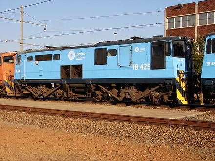 No. 18-425 (E1460) in PRASA blue livery at Sentrarand, 28 September 2015