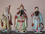 Porcelain statues of Fu, Lu, and Shou