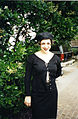 Image 17Woman dressed in black maxi skirt, top and hat, 1995. (from 1990s in fashion)