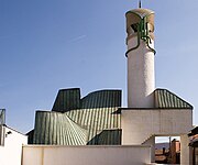 Šerefudin's White Mosque (1980) by Zlatko Ugljen in Visoko references traditional Bosnian mosque architecture