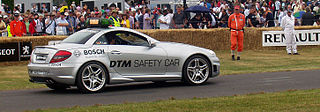 <span class="mw-page-title-main">Safety car</span> Car which limits the speed of competing cars on a racetrack