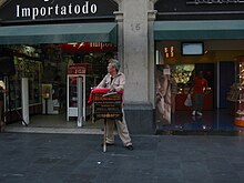 A barrel organ player in Mexico City just off the Zocalo or main plaza HurdygurdymanMexicoCity.JPG