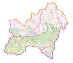 Mapa konturowa powiatu tatrzańskiego, w centrum znajduje się punkt z opisem „Kompleks skoczni narciarskich Średniej Krokwi”