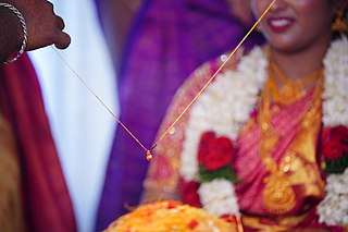 <span class="mw-page-title-main">Mangala sutra</span> Necklace, tied around the brides neck in Hindu weddings