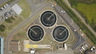 <span class="mw-page-title-main">Clarifier</span> Settling tanks for continuous removal of solids being deposited by sedimentation