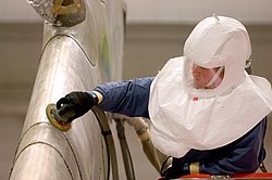 Scuff sanding a KC-10 aircraft, before painting Scuff sanding.jpg