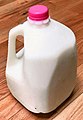 Plastic bottle of milk. One US gallon