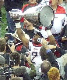 Calgary's JoJuan Armour celebrates his team's 2008 championship. Montreal Jojuan Armour.jpg