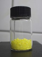 A very pure sample of niobium pentachloride Niobium pentachloride solid.jpg