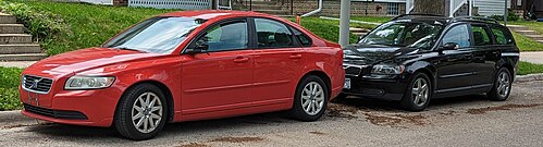 Volvo S40 parked next to Volvo V50, a station wagon variant. PXL 20230603 180201807.jpg