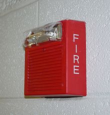 A fire alarm that warns people if a building is on fire Wheelock-as.jpg