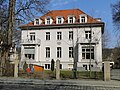 Villa mit Einfriedung