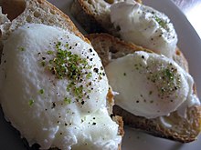 Poached eggs sprinkled with matcha and salt, served on sourdough bread Poached eggs with moccha salt.jpg