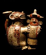 Recuay effigy of a feline attacking a warrior, Musée du Quai Branly, Paris