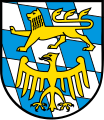 Landkreis Starnberg Den bayerischen Rauten aufgelegt oben ein schreitender goldener Löwe, unten ein goldener Adler.