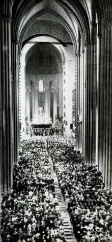 8,000 attend the Charter Day convocation in the Cathedral of St. John the Divine, October 31, 1954. ColumbiaBicentennialConvocation.png