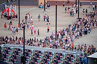 Several lines of fans in front of U.S. Bank Stadium