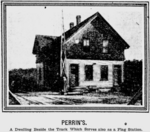 old two-story building the size of a small house near railroad tracks