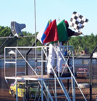 <span class="mw-page-title-main">Racing flags</span> Flags used to communicate with racecar drivers