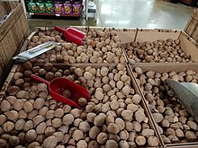 Walnuts in their shells available for sale in a supermarket in the United States Walnuts in their shells available for sale.jpg