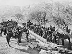 Australians of the Anzac Mounted Division watering their horses at the foot of Mount Zion in 1918