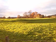 The banks of Brocavum Roman fort in the foreground; Brougham Castle is in the background Brocavum.jpg