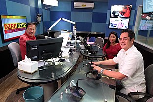 PCOO secretary Martin Andanar (right) shares light moments with DZRH radio program hosts Joe Taruc and Milky Rigonan on July 15, 2016. PH3-071516-RLN2.jpg