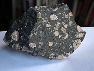 <span class="mw-page-title-main">Quartz-porphyry</span> Type of volcanic rock containing large porphyritic crystals of quartz