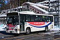 朝日自動車グループカラーの路線バス車両（水上駅）