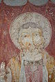 Allegory of the Holy Trinity, painted as three faces fused in one, medieval fresco in Perugia