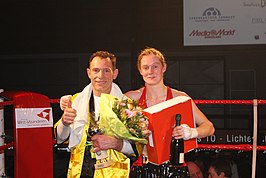 Delfine Persoon met haar trainer Filiep Tampere bij de winst van haar wereldtitel, februari 2013