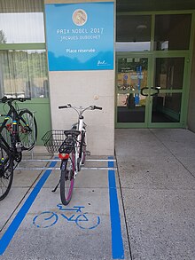 Parking Place Reserved for Jacques Dubochet on the University of Lausanne Campus BicycleParkingPlaceForJacquesDubochetUNIL.jpg