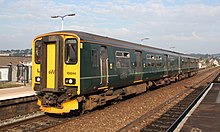 A Class 150 bound for Paignton on the Riviera Line calling at St Thomas station in 2018.