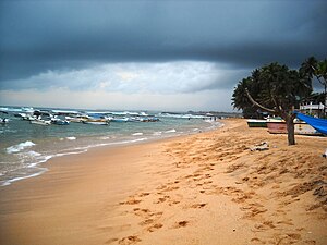 Hikkaduwa beeach with coral reefs Hikkaduwa Beach.JPG