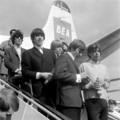 Bill Wyman, Keith Richards, Brian Jones, Charlie Watts and Mick Jagger at Amsterdam Airport Schiphol, 1964