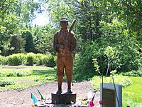 Holliston, Massachusetts - Mudville Village, Statue and Plaque Dedicated to "Casey" of "Casey at the Bat" Holliston-mudville-casey-statue.jpg