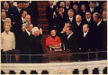 Mrs. Nixon hold the family Bibles as Richard Nixon is sworn in as President