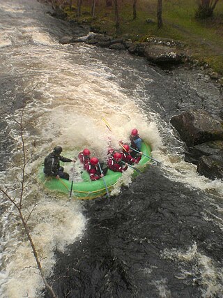 <span class="mw-page-title-main">Hydraulic jump</span> Discharge of high velocity liquid into lower velocity area