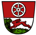 Haßloch (Rüsselsheim am Main): Oben im Wappen das Mainzer Rad, unten ein laufender Hase.