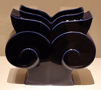 Postmodern vase inspired by the Ionic capital, deisgned by Michael Graves for Swid Powell, 1989, glazed porcelain, Indianapolis Museum of Art, Indianapolis, US[37]