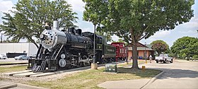 SDCX steam locomotive next to Allen Heritage Center