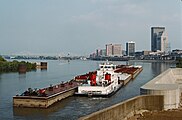 Towboat Valvoline upbound with empty tank barges in Portland Canal, Louisville, Kentucky, USA, 1987