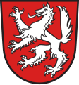 Stadt Hauzenberg In Rot ein steigender silberner Wolf.