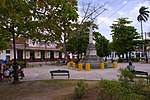 The Marta Abreu train station is located across Martyrs' Park. At the center is the truncated pillar monument dedicated to the martyrs of the Colonial Independence War.