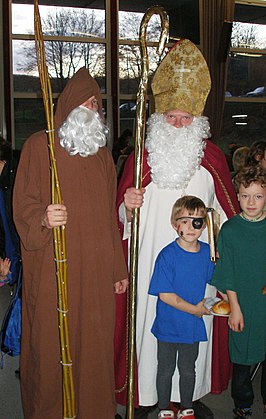 Samichlaus (met staf) en Knecht Ruprecht (met roe) in Duitsland